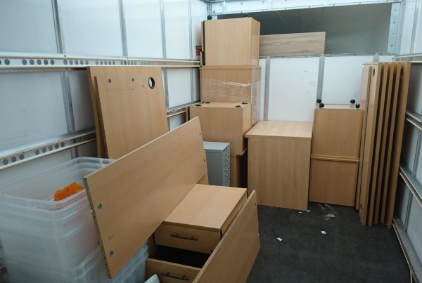A removals van filled with office furniture self storage.
