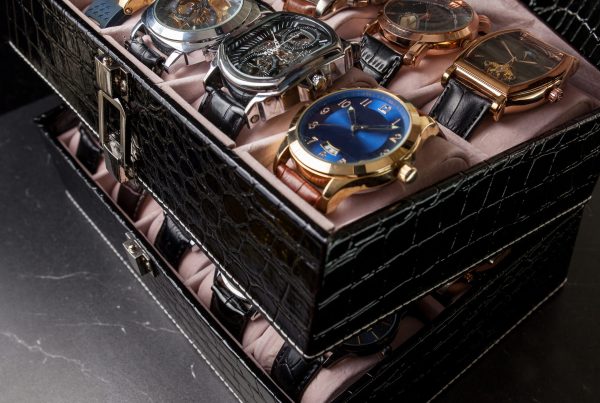 Storage box with collection of men wrist watches. Storage black leather box with collection of men wrist watches