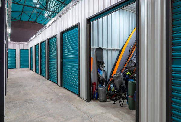 Outdoors activity items seen through the open door of the self storage unit. Rental Storage Units.